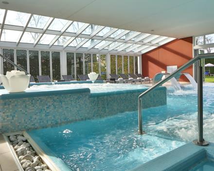 Heated dynamic swimming-pool with fountains and whirlpools.